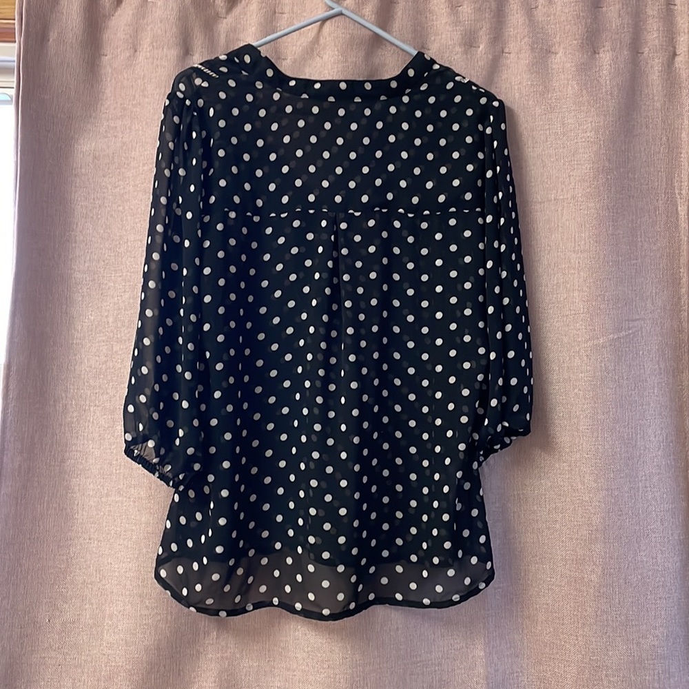 Dark blue polka dot dress shirt.